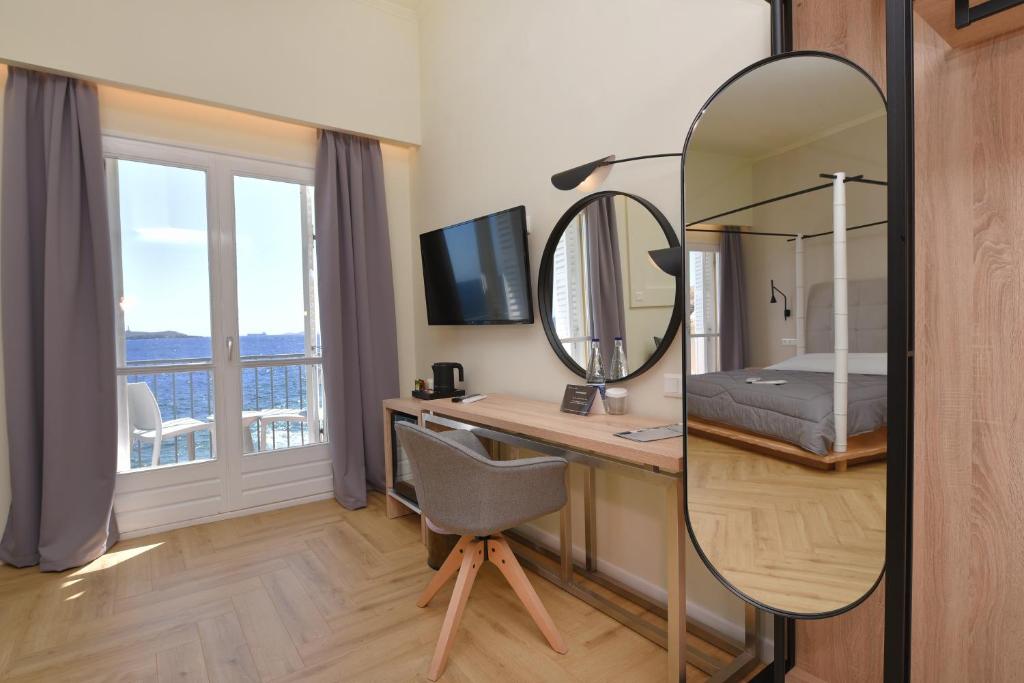 TV a/nebo společenská místnost v ubytování Hotel Hermes
