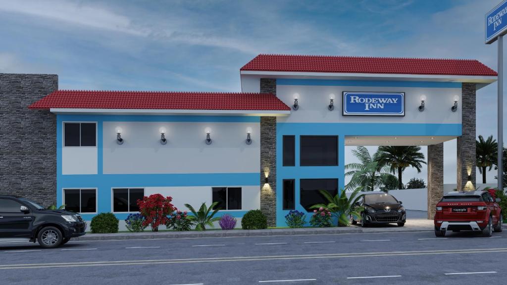 a rendering of a recovery inn car dealership at Rodeway Inn Artesia Cerritos in Artesia