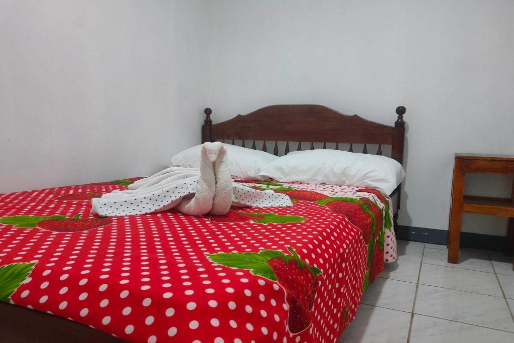 Postel nebo postele na pokoji v ubytování Istroberi Inn Palawan near Airport