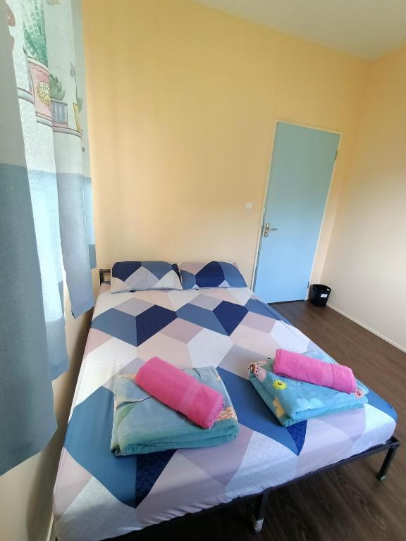 Postel nebo postele na pokoji v ubytování Kundasang Trail Homestay