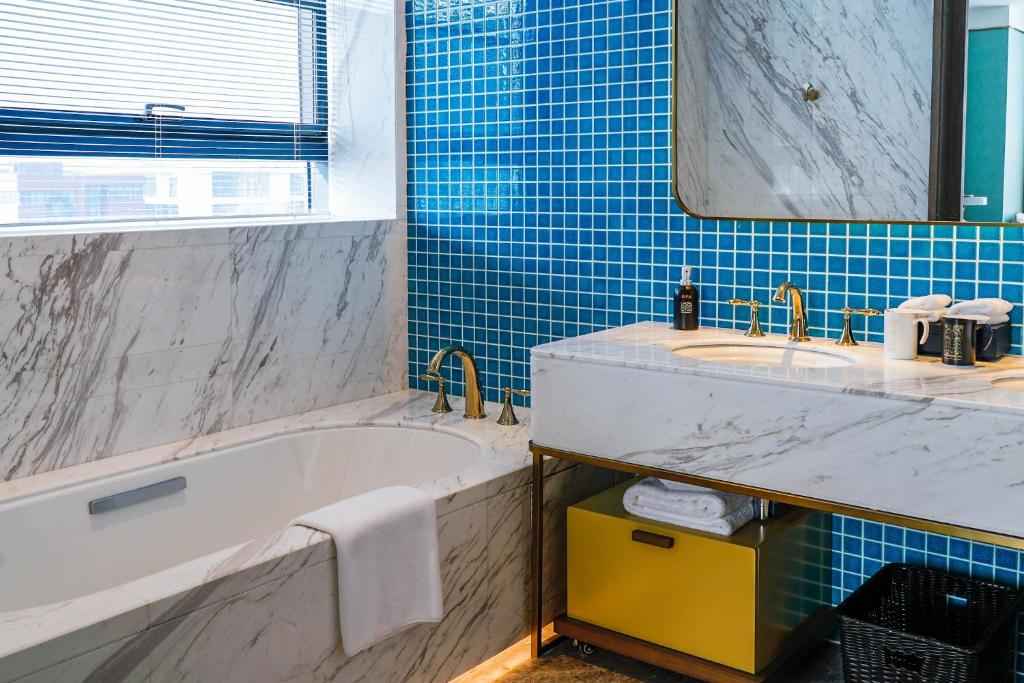 Koupelna v ubytování Qingdao Oriental Studio Chuangzhi SSAW Hotel