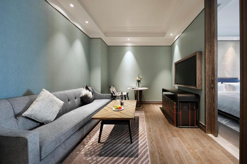 Posezení v ubytování Qingdao Oriental Studio Chuangzhi SSAW Hotel