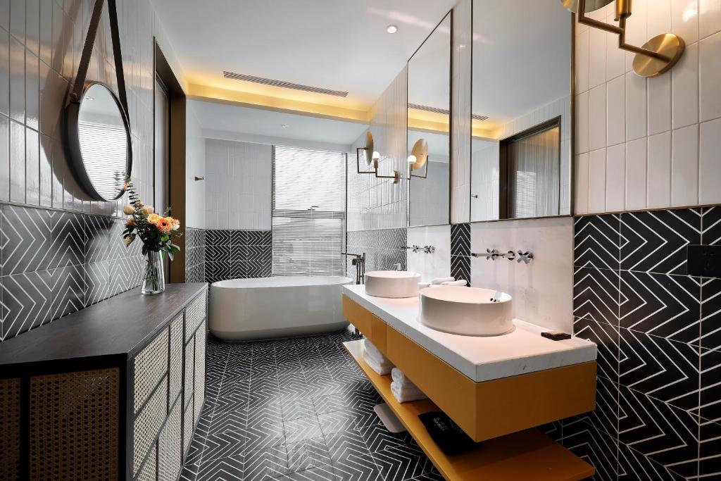 Koupelna v ubytování Qingdao Oriental Studio Chuangzhi SSAW Hotel