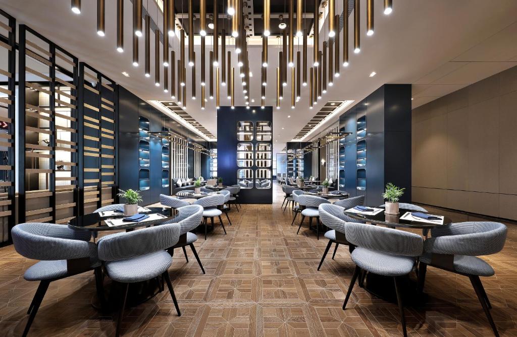 Posezení v ubytování Qingdao Oriental Studio Chuangzhi SSAW Hotel