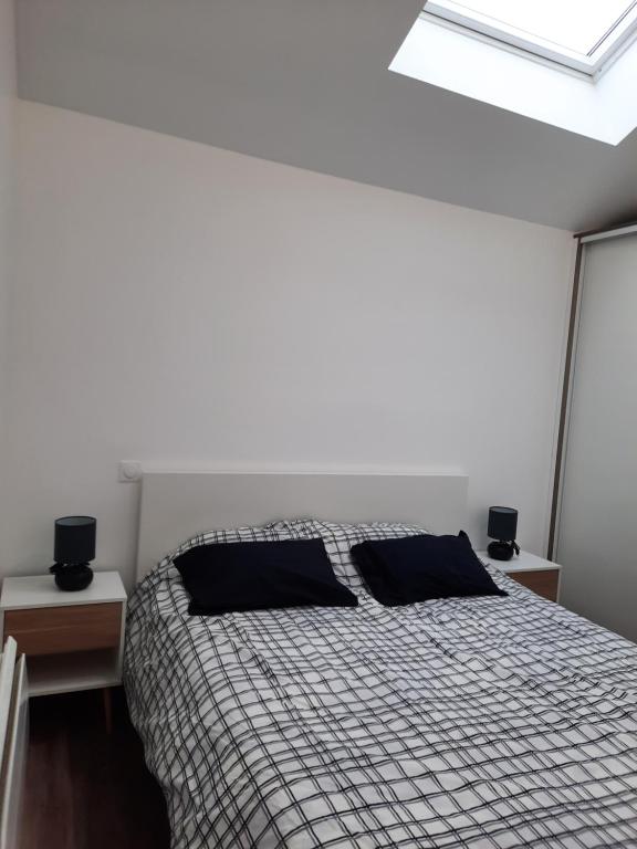 Posteľ alebo postele v izbe v ubytovaní Duplex proche de Genève et du lac léman