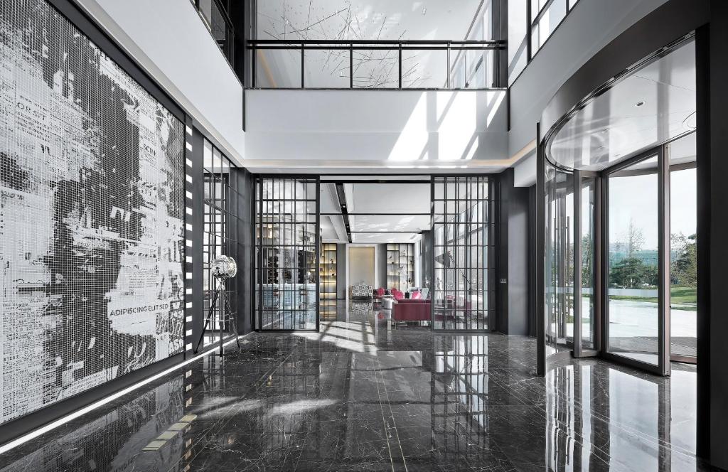 Posezení v ubytování Qingdao Oriental Studio Chuangzhi SSAW Hotel