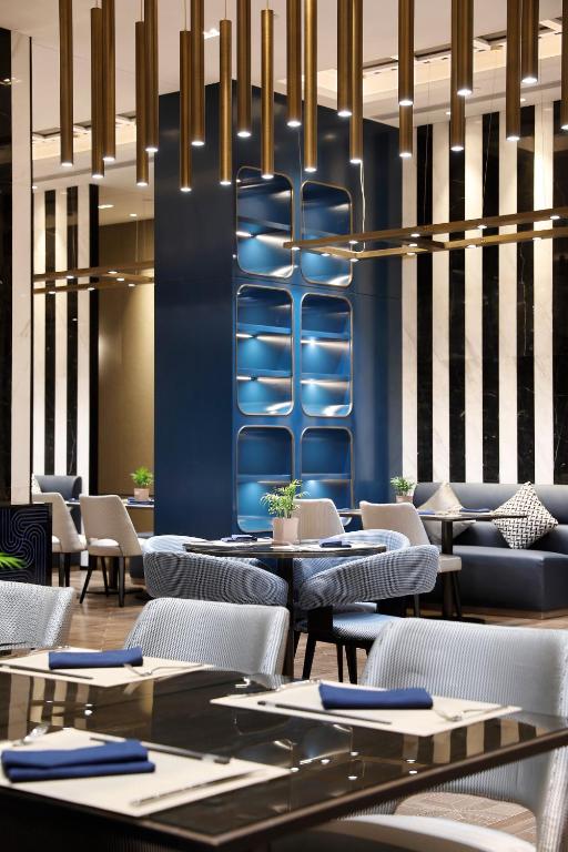 Posezení v ubytování Qingdao Oriental Studio Chuangzhi SSAW Hotel