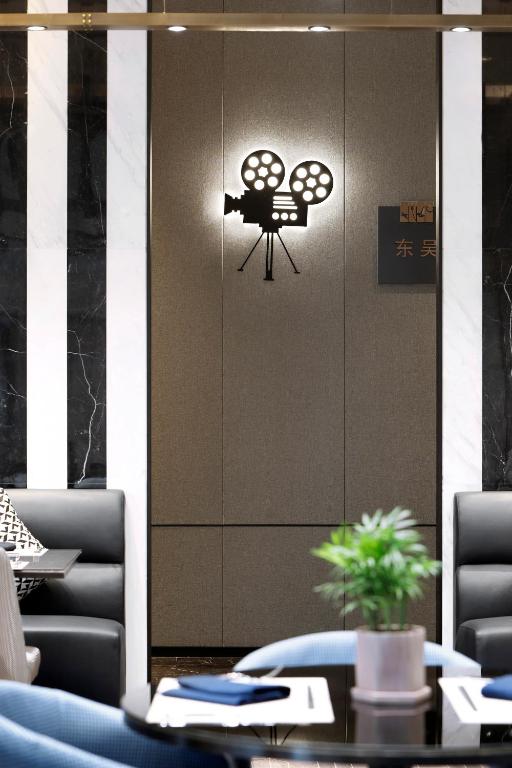 Posezení v ubytování Qingdao Oriental Studio Chuangzhi SSAW Hotel