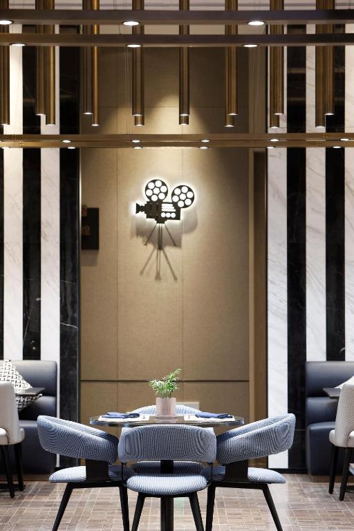 Posezení v ubytování Qingdao Oriental Studio Chuangzhi SSAW Hotel