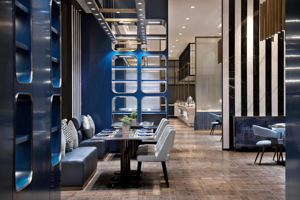 Posezení v ubytování Qingdao Oriental Studio Chuangzhi SSAW Hotel