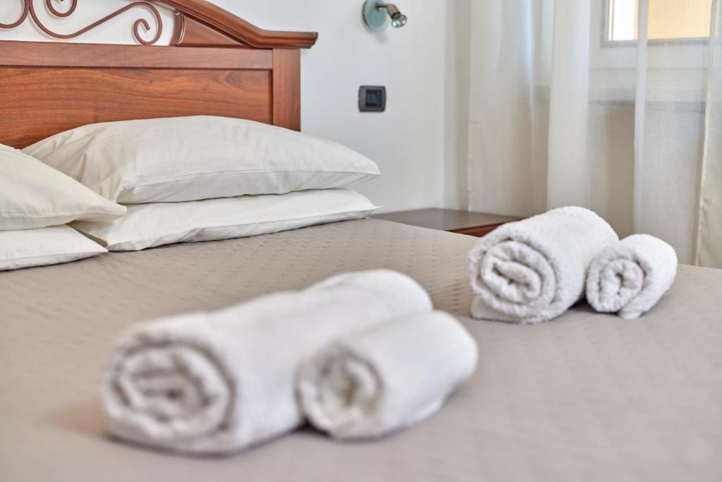 A bed or beds in a room at Gionno's apartment