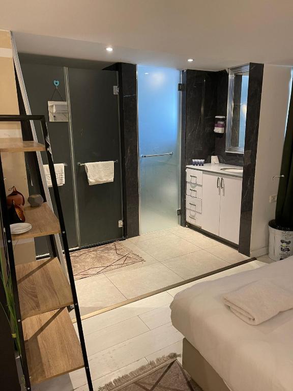 Postel nebo postele na pokoji v ubytování Elven Hotel