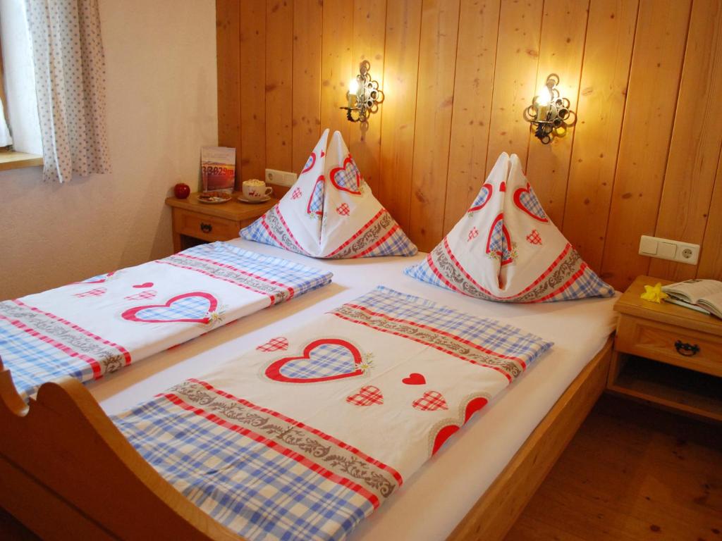 Postel nebo postele na pokoji v ubytování Haus Südblick
