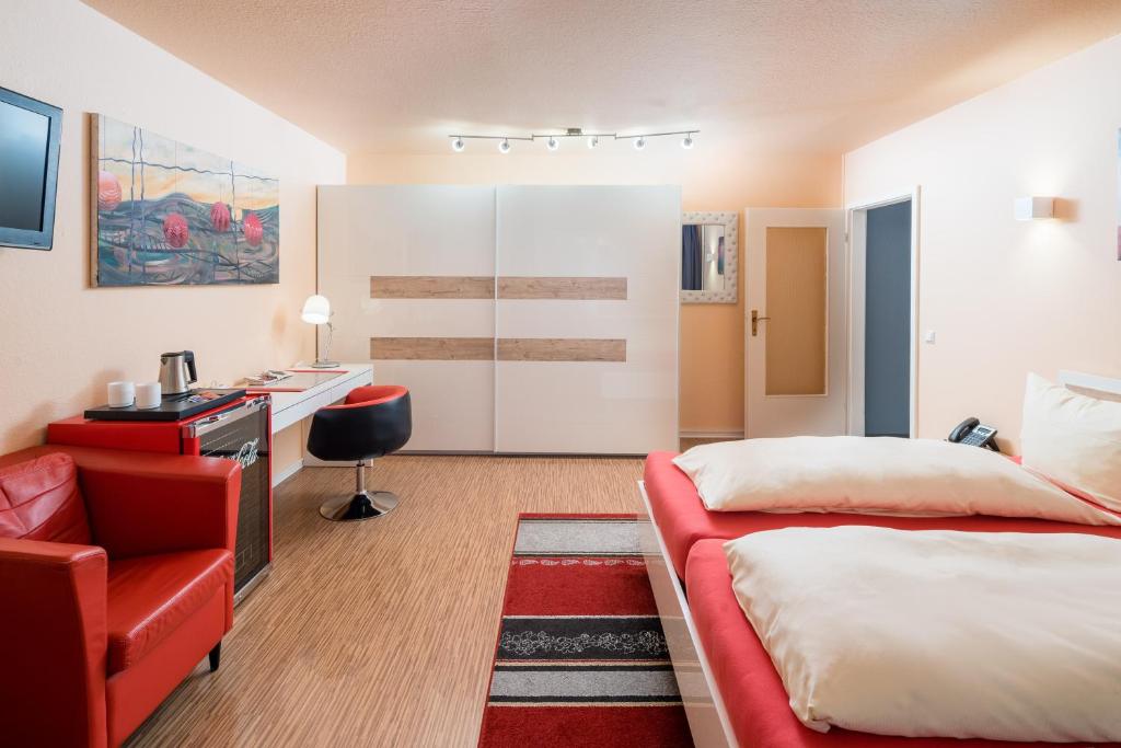 Postel nebo postele na pokoji v ubytování Hotel Am Gottesauer Schloss