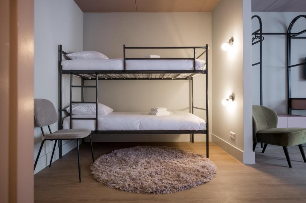 Postel nebo postele na pokoji v ubytování Hotel Halbert