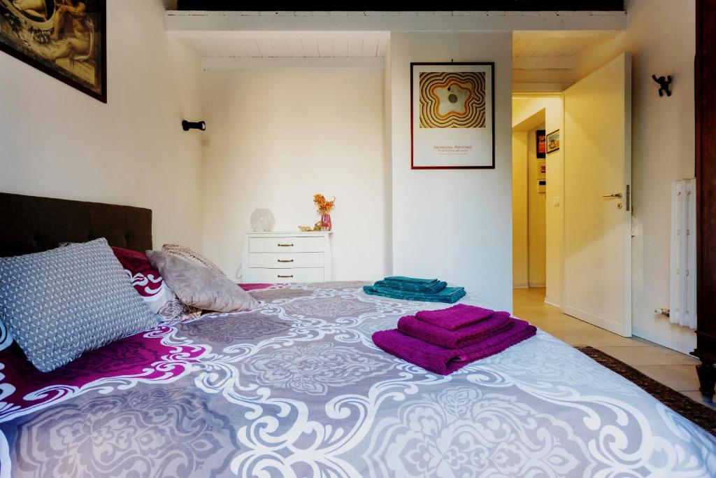 Posteľ alebo postele v izbe v ubytovaní Arimatea Casa Vacanza