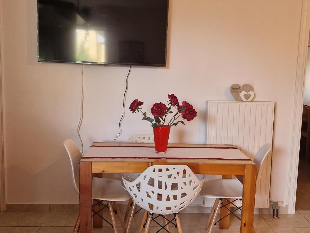 A television and/or entertainment centre at Maria's Apartments
