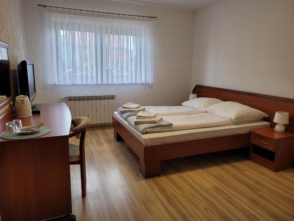 Postel nebo postele na pokoji v ubytování U Juhasa Miętówka