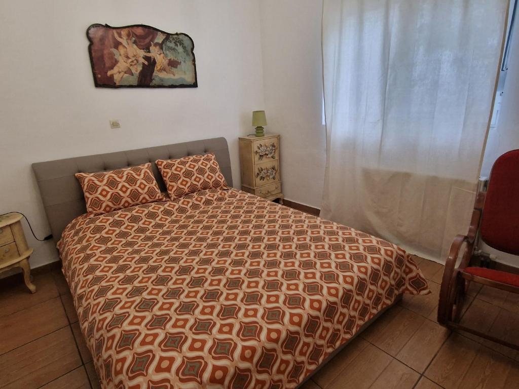 A bed or beds in a room at Maria's Apartments