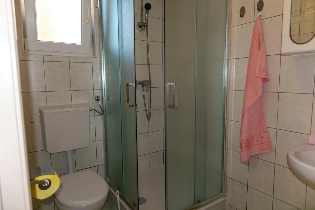 Koupelna v ubytování Apartments Ante