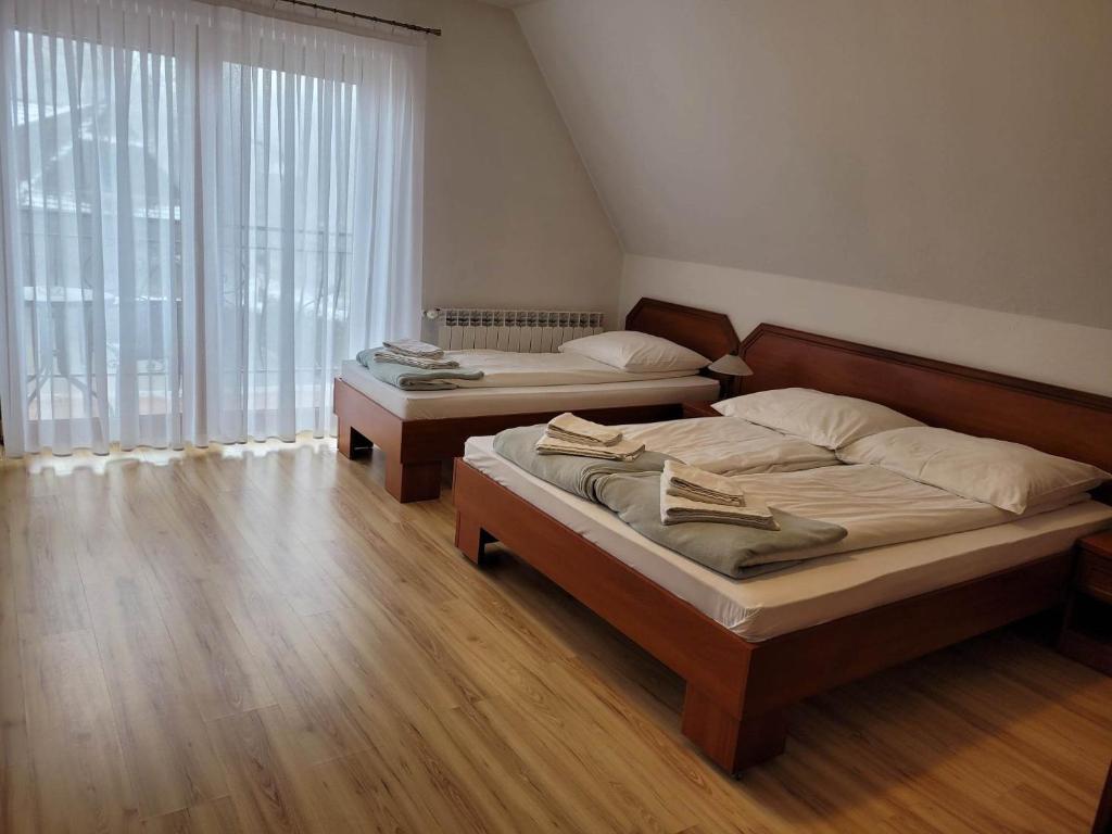 Postel nebo postele na pokoji v ubytování U Juhasa Miętówka