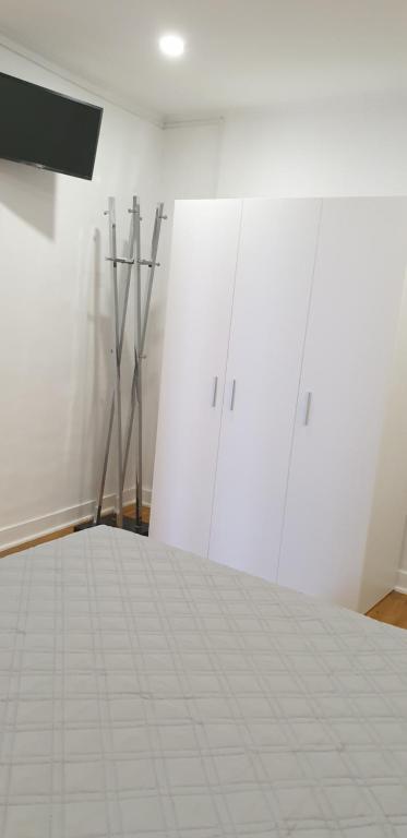 Postel nebo postele na pokoji v ubytování Pátio das Cantigas