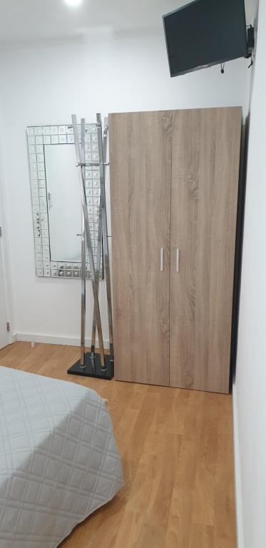 Postel nebo postele na pokoji v ubytování Pátio das Cantigas