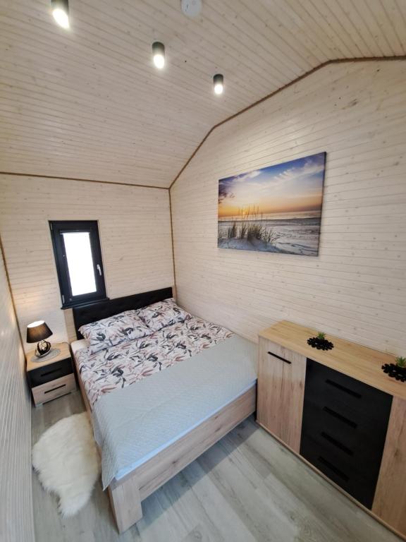 Postel nebo postele na pokoji v ubytování Domek AlMar