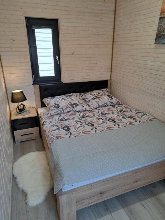 Postel nebo postele na pokoji v ubytování Domek AlMar