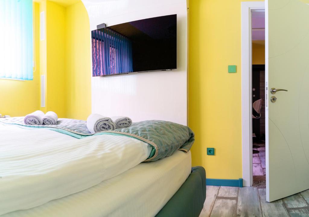 Postel nebo postele na pokoji v ubytování Sofiel cozy apartment - Top Center Sofia