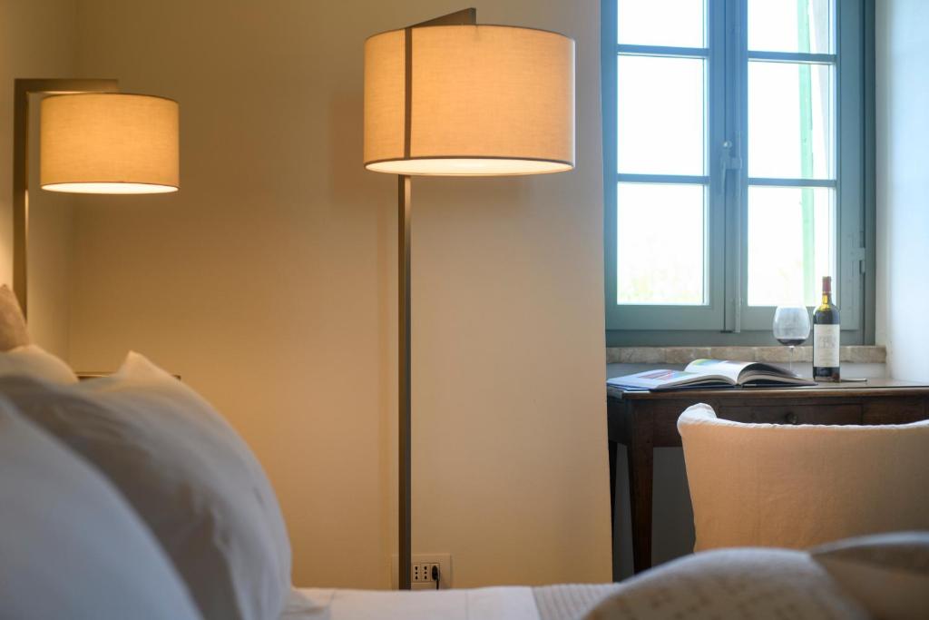 Postel nebo postele na pokoji v ubytování Albergo Diffuso Borgo Santo