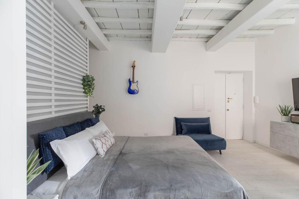 A bed or beds in a room at iFlat The G Flat