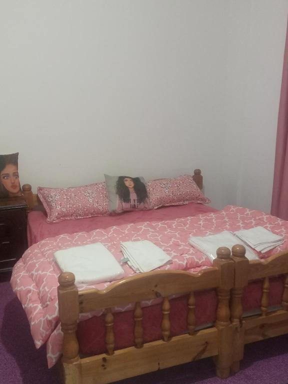 Postel nebo postele na pokoji v ubytování taila hostel