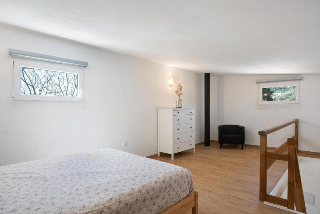 Postel nebo postele na pokoji v ubytování Casa la Yeguada