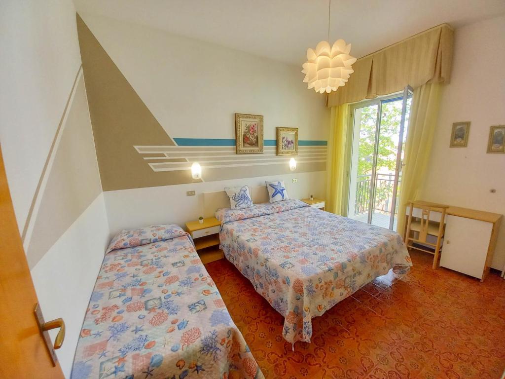 A bed or beds in a room at PetlyApartments