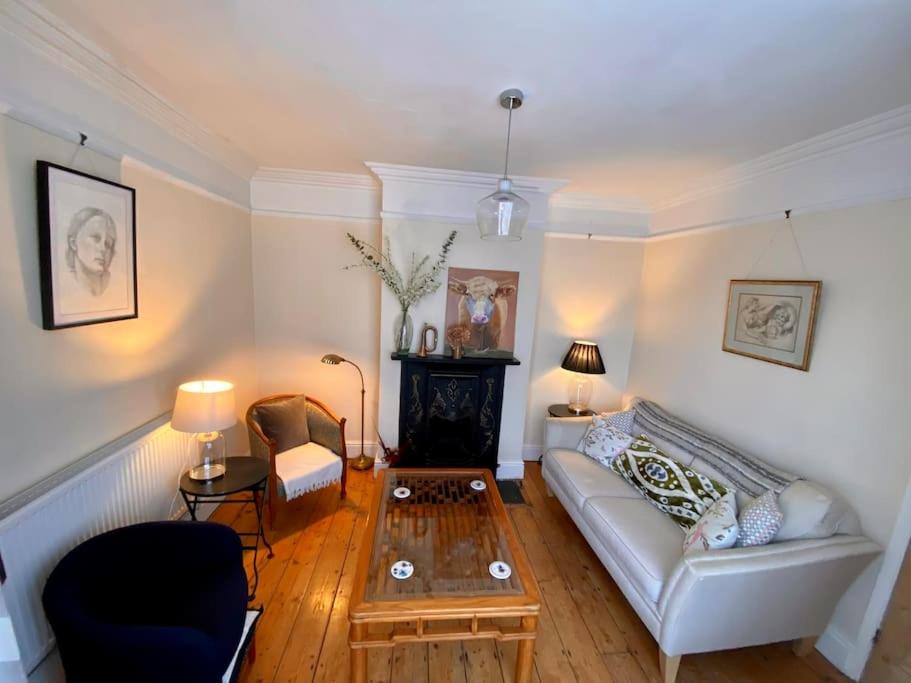 a living room with a couch and a coffee table at River walk . Shrewsbury.Shropshire.With parking. in Shrewsbury
