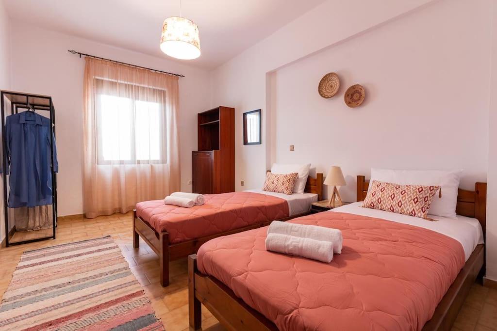 Postel nebo postele na pokoji v ubytování Alonia Summerhouse in Fanes