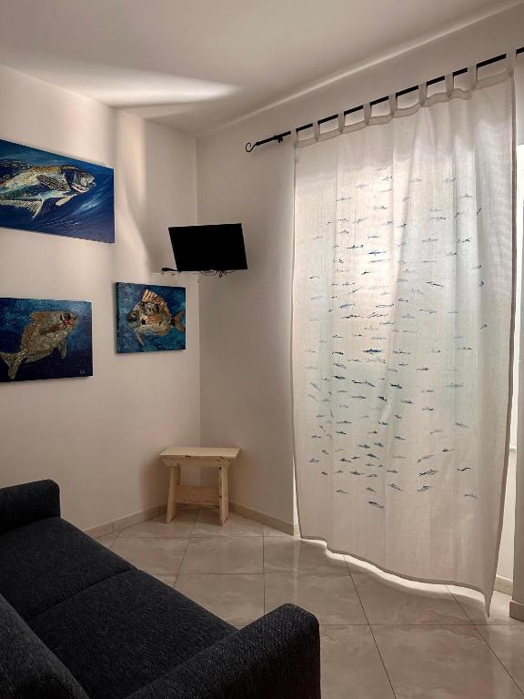 TV a/nebo společenská místnost v ubytování Casa del Palombaro