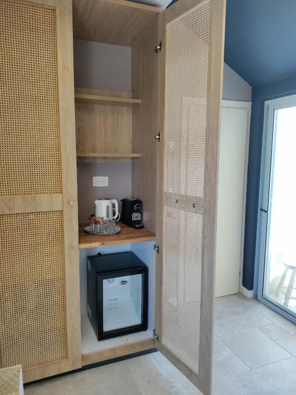 Kuchyň nebo kuchyňský kout v ubytování Mina Boutique