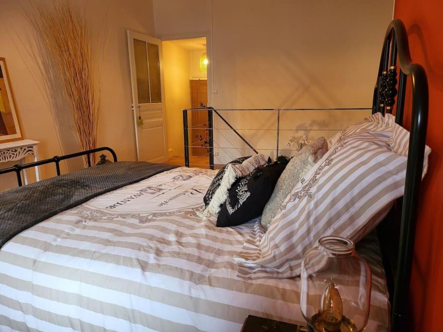 Posteľ alebo postele v izbe v ubytovaní Duplex bohème chic