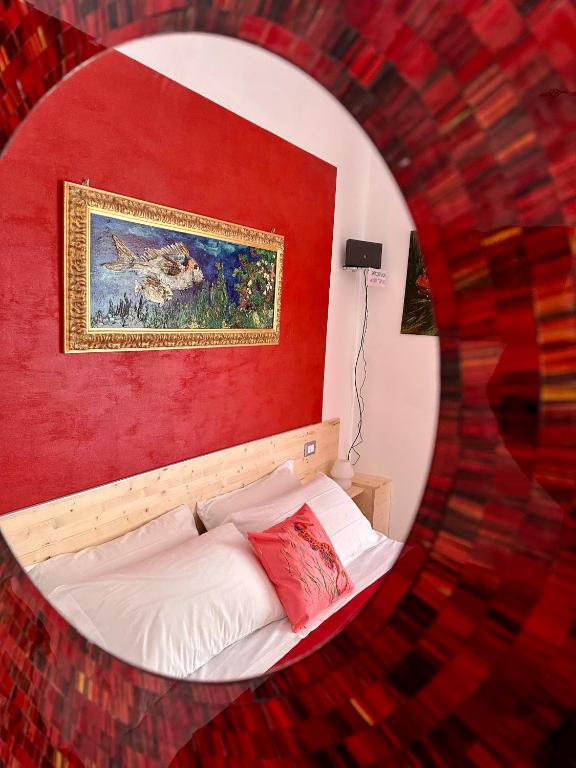 Postel nebo postele na pokoji v ubytování Casa del Palombaro