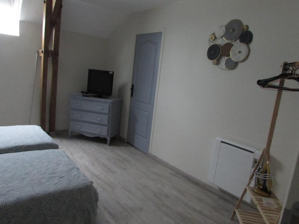 Posteľ alebo postele v izbe v ubytovaní Gîte T'ché Dédée