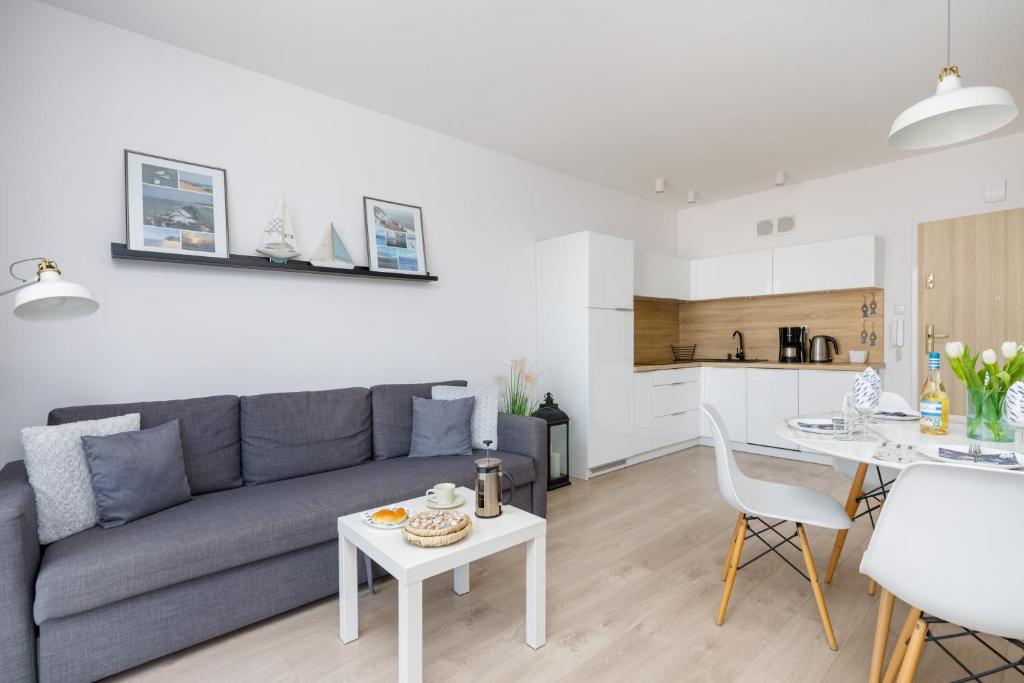 Kuchyňa alebo kuchynka v ubytovaní Osiedle Feniks Kołobrzeg by Noclegi Renters