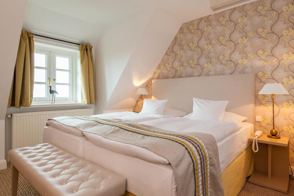 Postel nebo postele na pokoji v ubytování Hotel Watthof