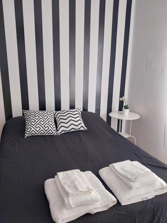 Кровать или кровати в номере Molo 33 Napoli