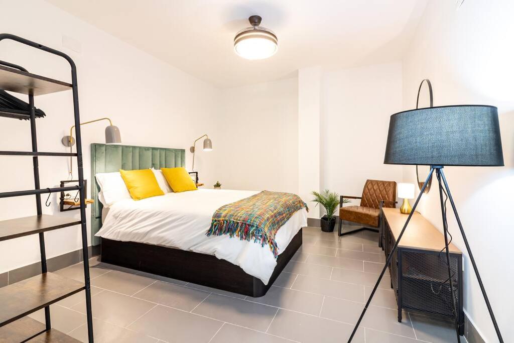 Posteľ alebo postele v izbe v ubytovaní Caramba FreshApartments