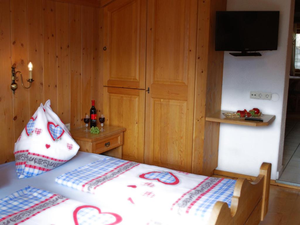 Postel nebo postele na pokoji v ubytování Haus Südblick