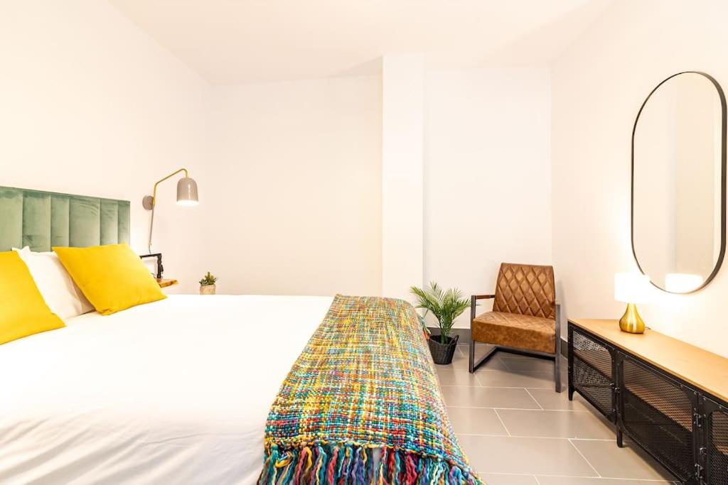 Posteľ alebo postele v izbe v ubytovaní Caramba FreshApartments