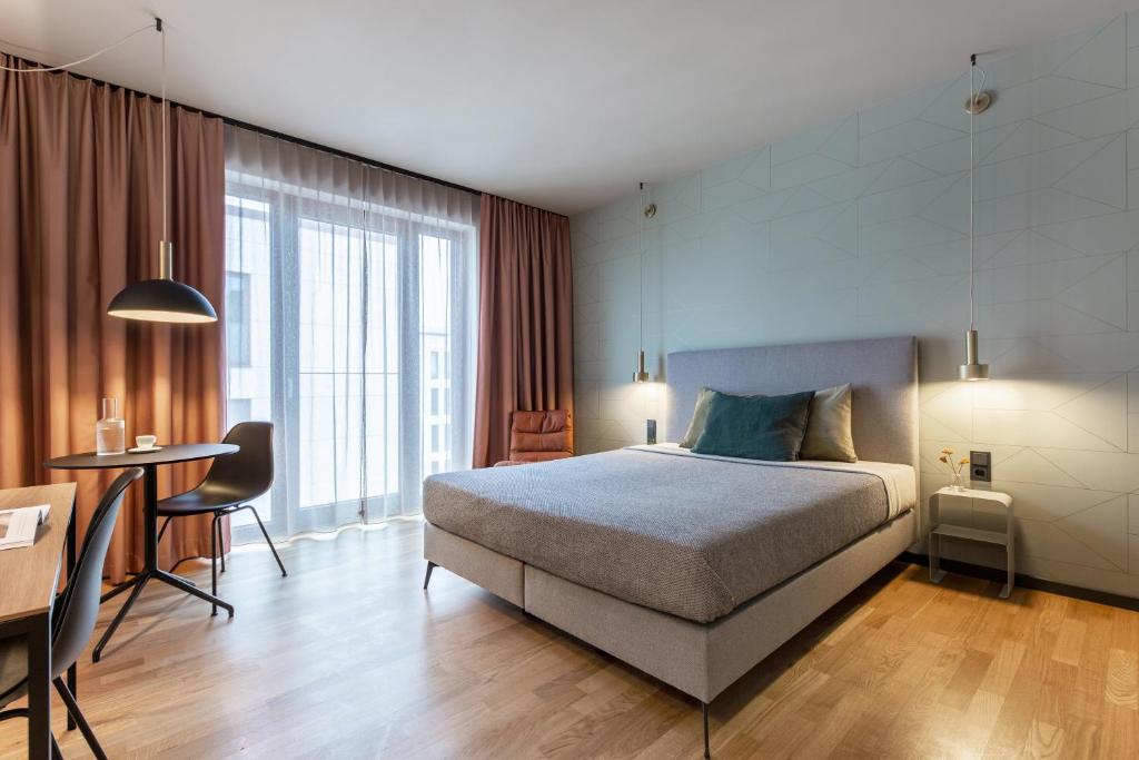 Cama ou camas em um quarto em ipartment Berlin Airport