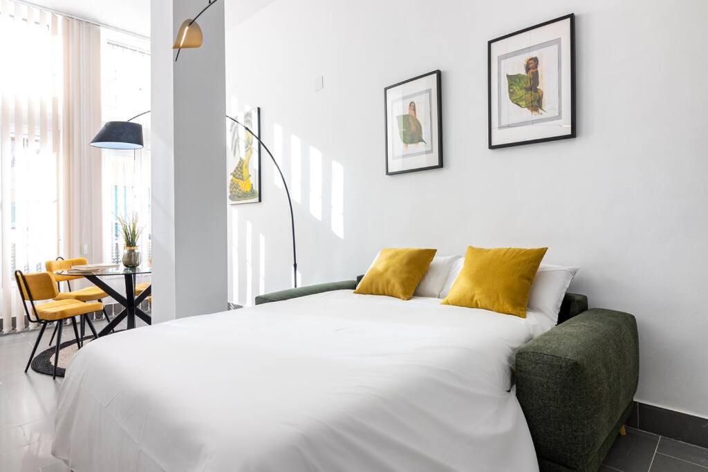 Posteľ alebo postele v izbe v ubytovaní Caramba FreshApartments
